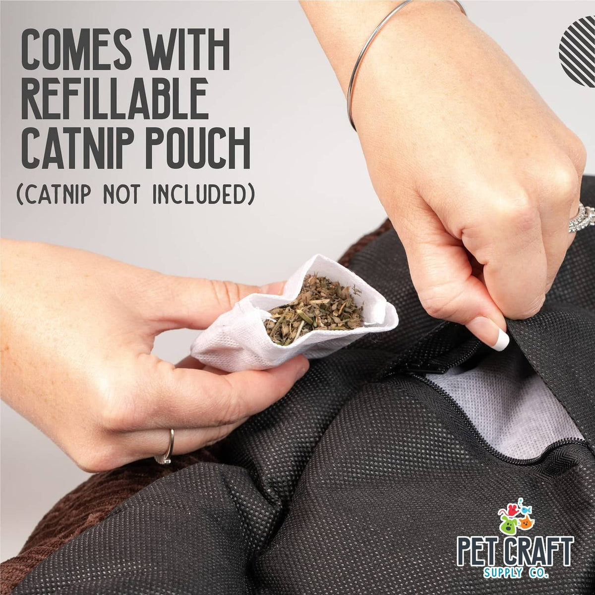 Hands opening a cat bed’s refillable catnip pouch on the side