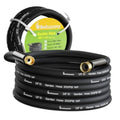 Black garden water hose coil with two brass connectors on the ends