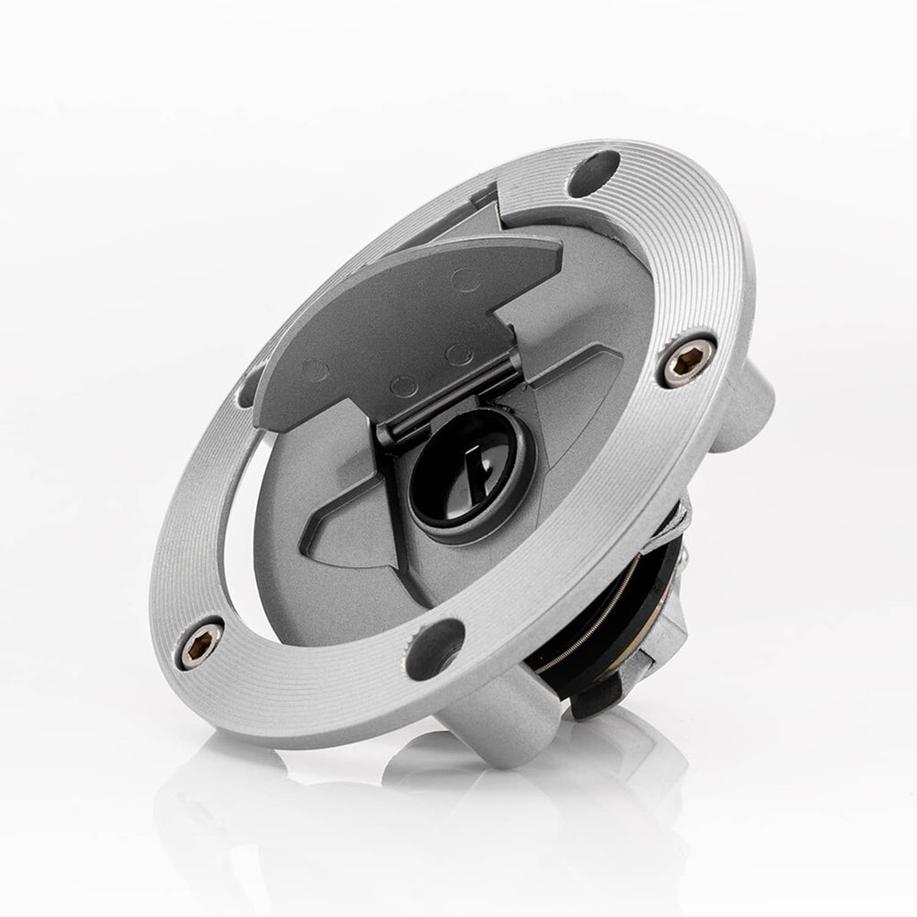 Round metal ignition switch with black lock cylinder and key opening