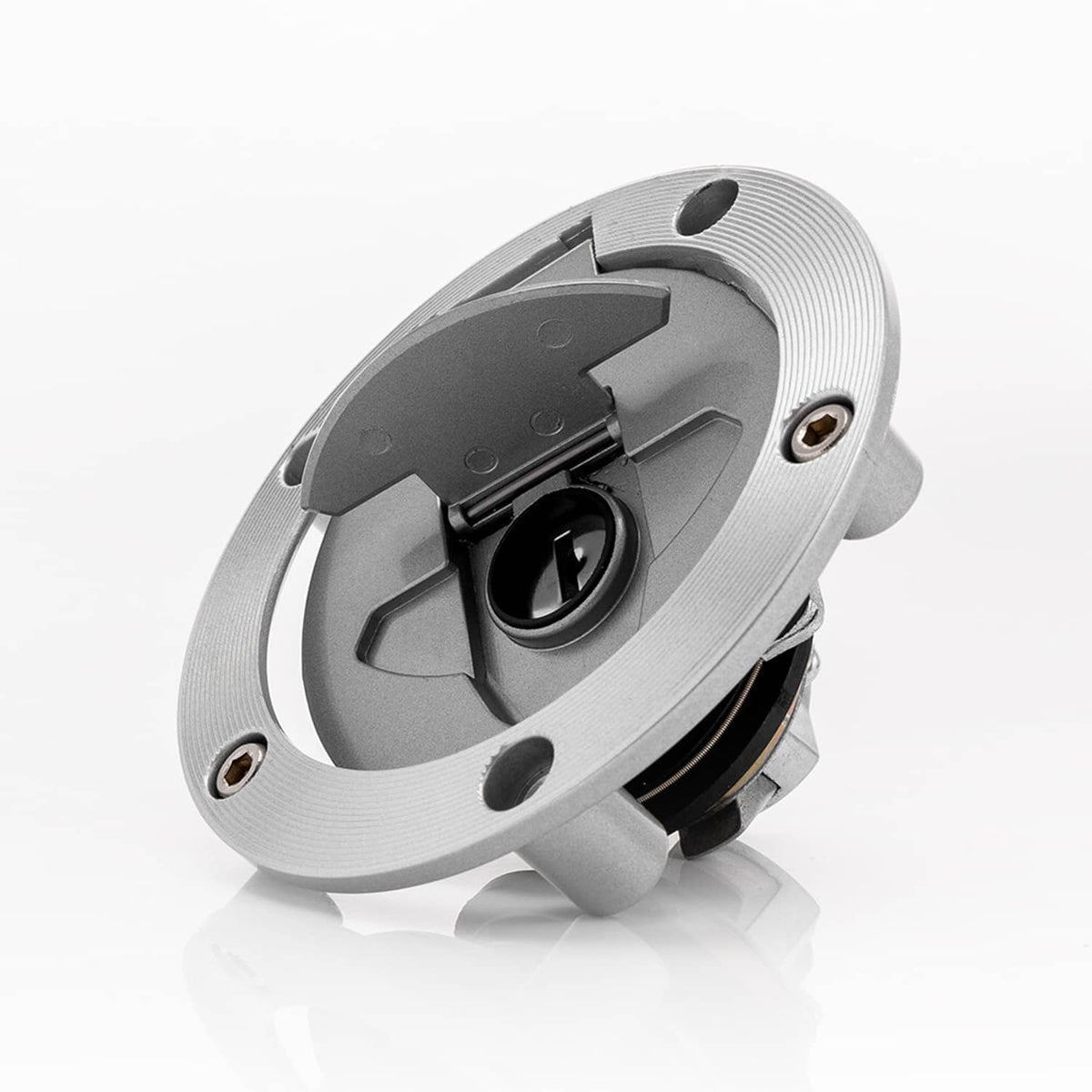 Round metal ignition switch with black lock cylinder and key opening