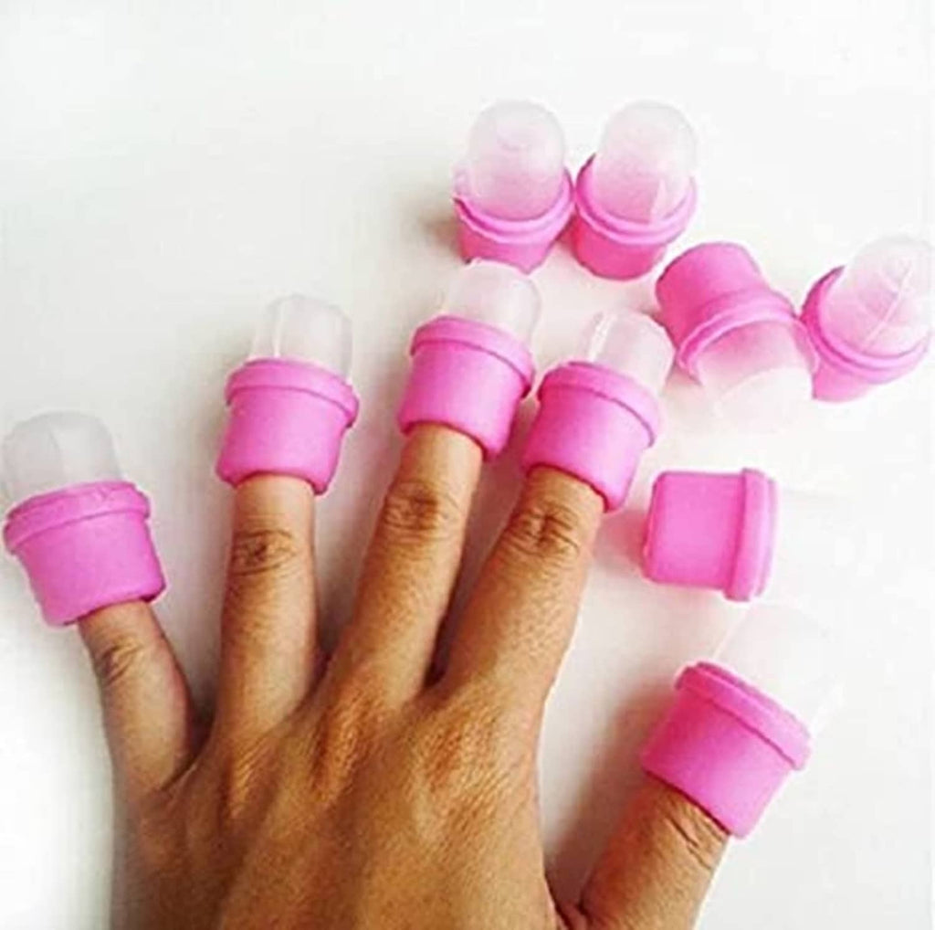 Pink wearable nail polish remover soak soakers, open caps on hand tips