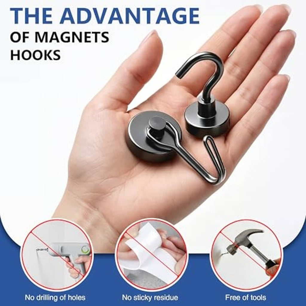 Black magnetic hook pair with curved steel hooks and round magnetic bases on open hand