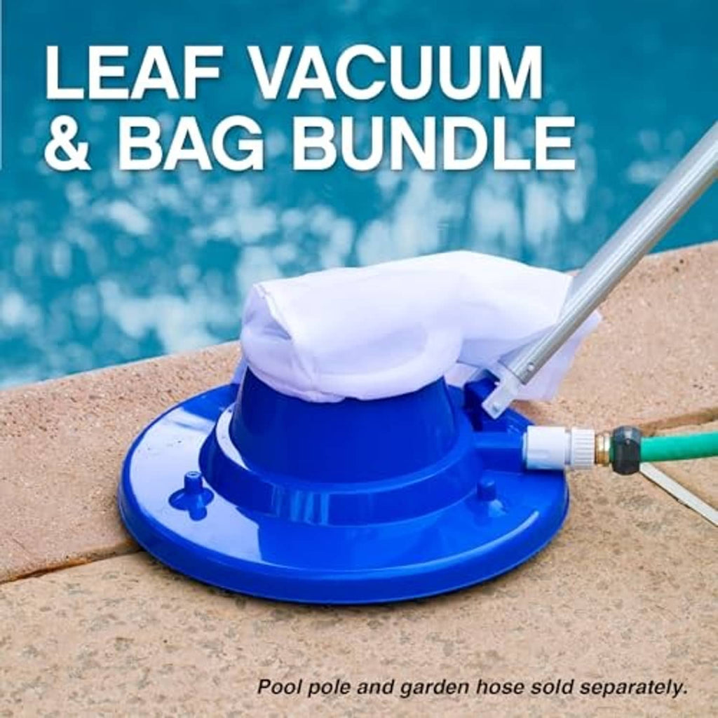 Blue pool leaf vacuum head with white bag attached to hose on pool deck