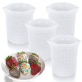 Four white silicone measuring cups with printed ml and ounce measurement lines
