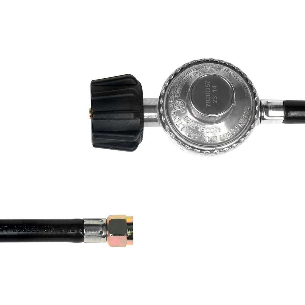 Close-up of propane regulator with black knob and black hose plus threaded brass connector