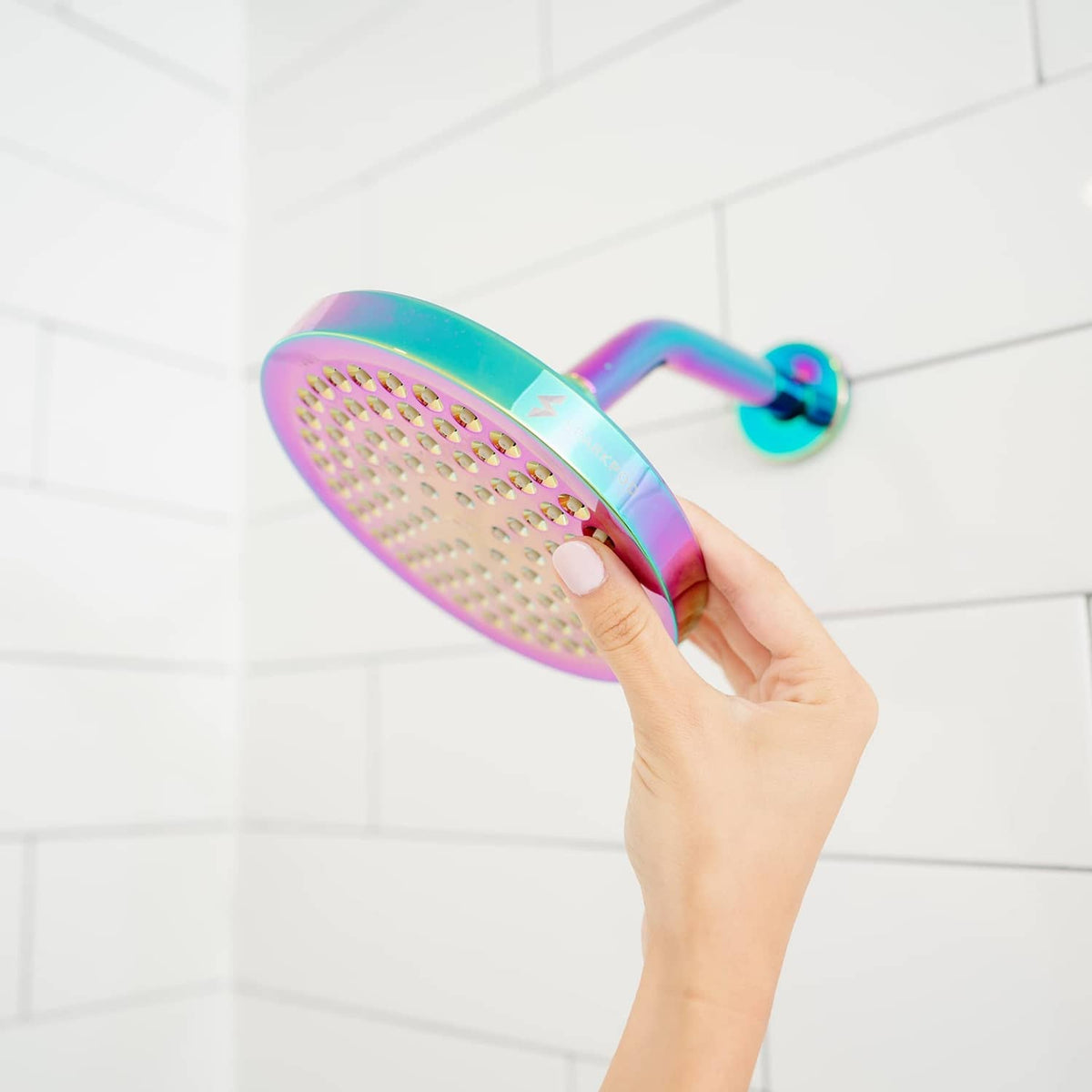 Rainbow 6-inch rain shower head with hand pressing the nozzle plate for cleaning