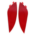 Pair of red rear bumper reflectors with angular, textured lens surface