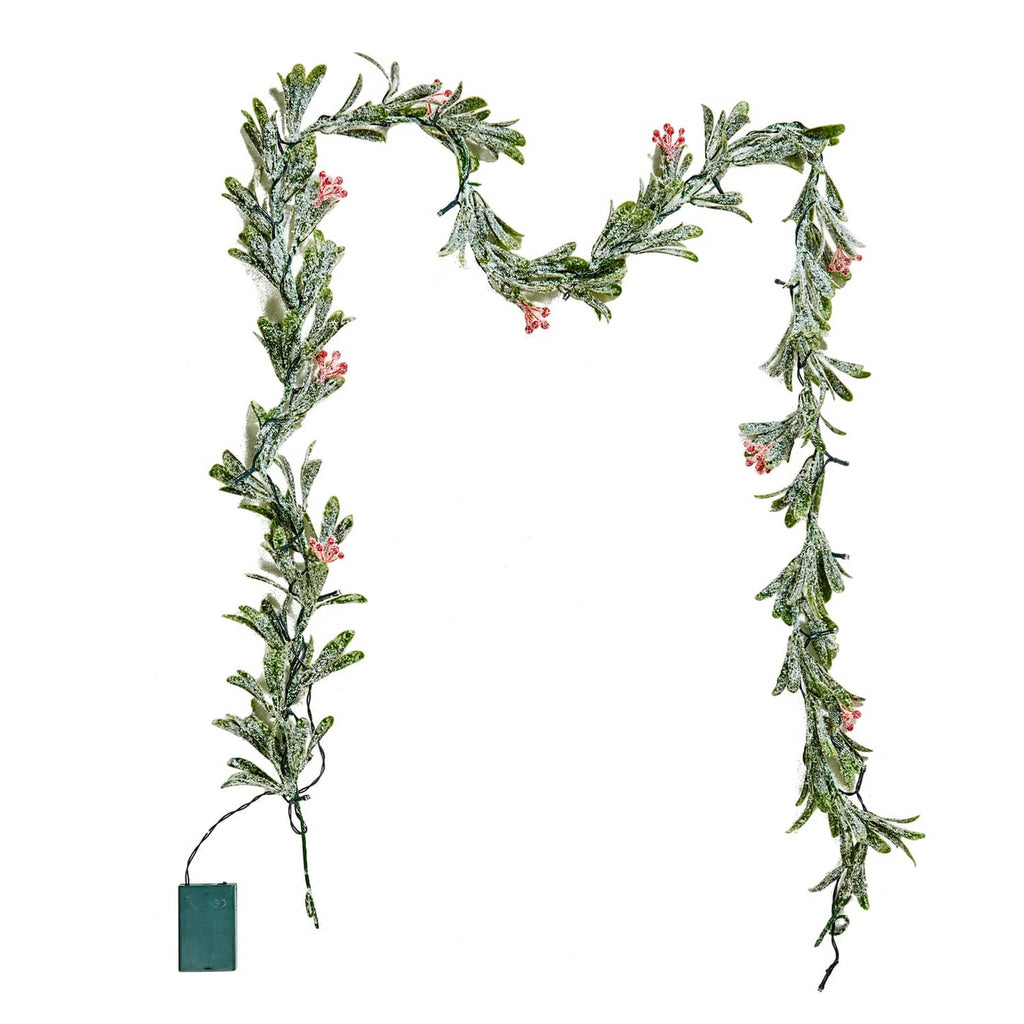 Olive leaf Christmas garland with red berries and hanging plug end on vine lights