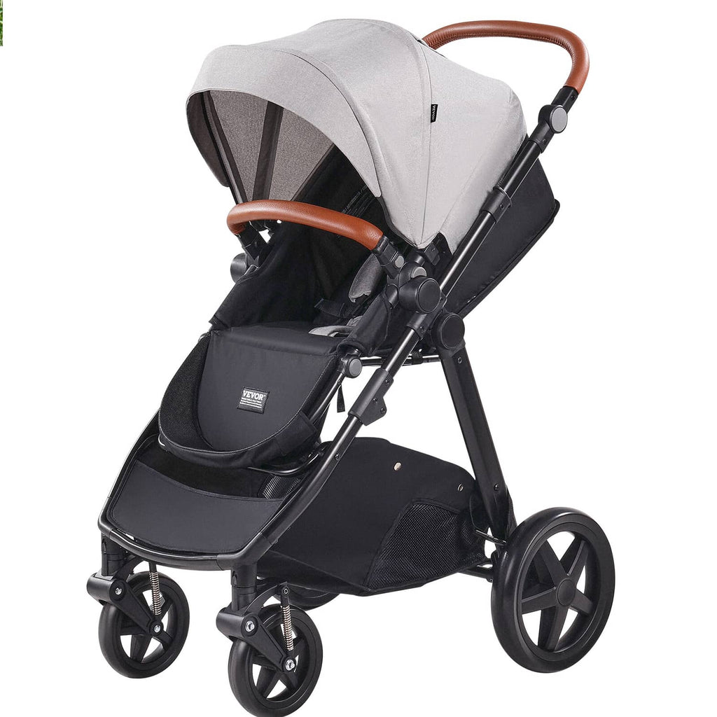 Light gray stroller bassinet with black chassis and brown handlebar