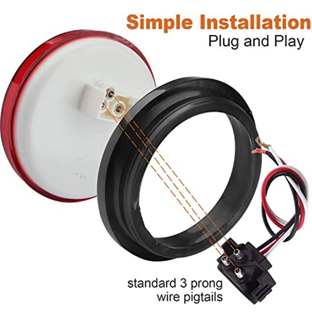 Two round LED tail lights with wiring pigtails and plug connector