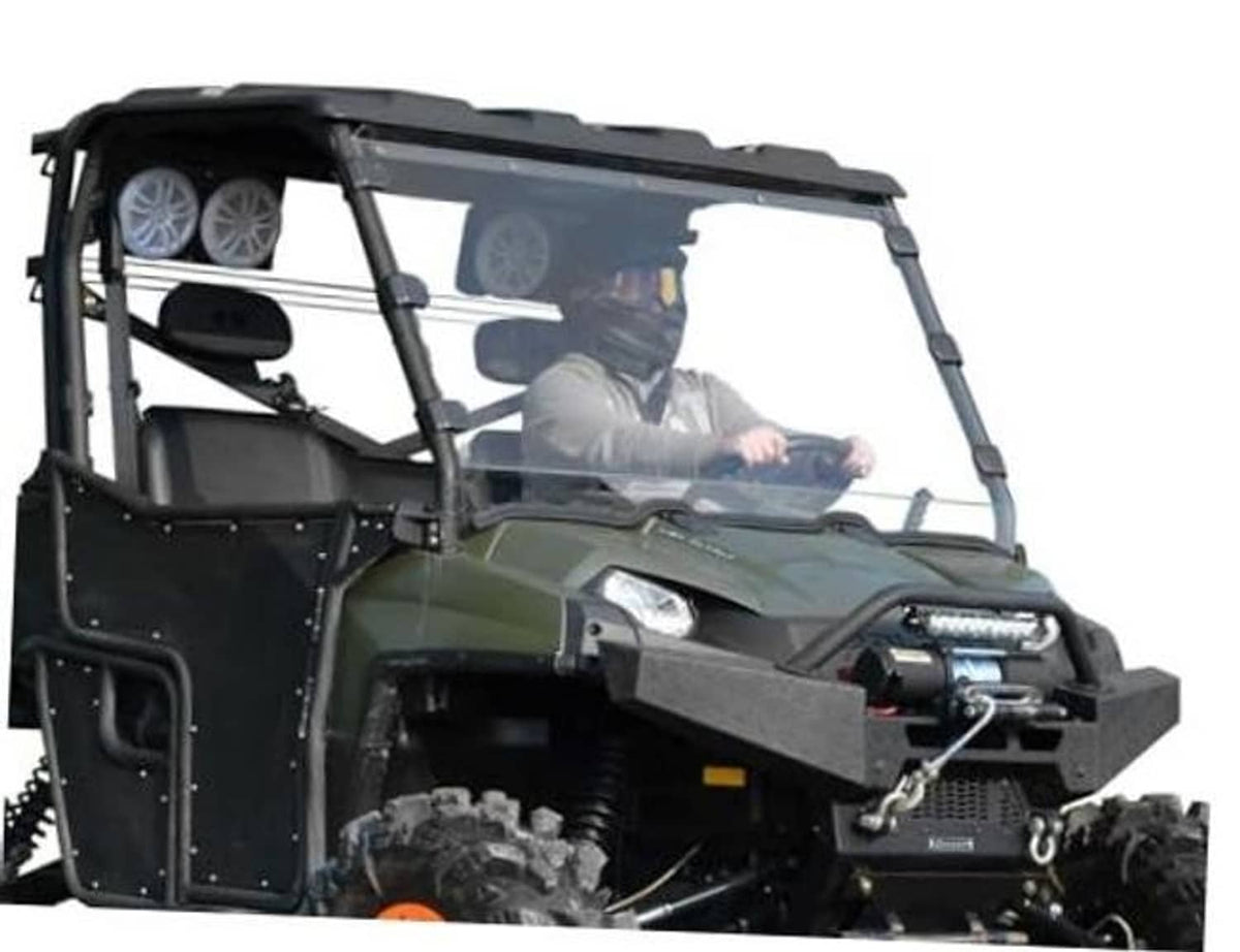 Clear full windshield installed on green Polaris Ranger-style UTV with driver visible