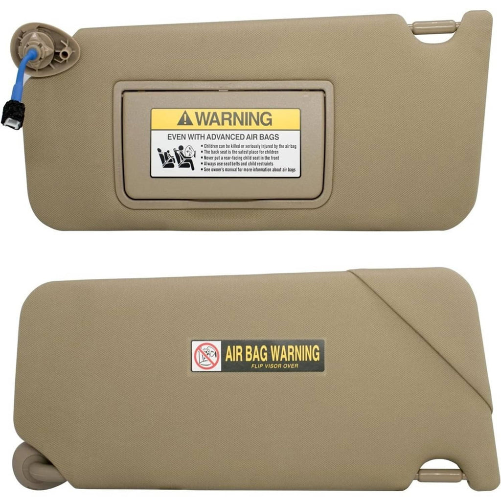 Beige left driver-side sun visor with warning label and light-equipped front