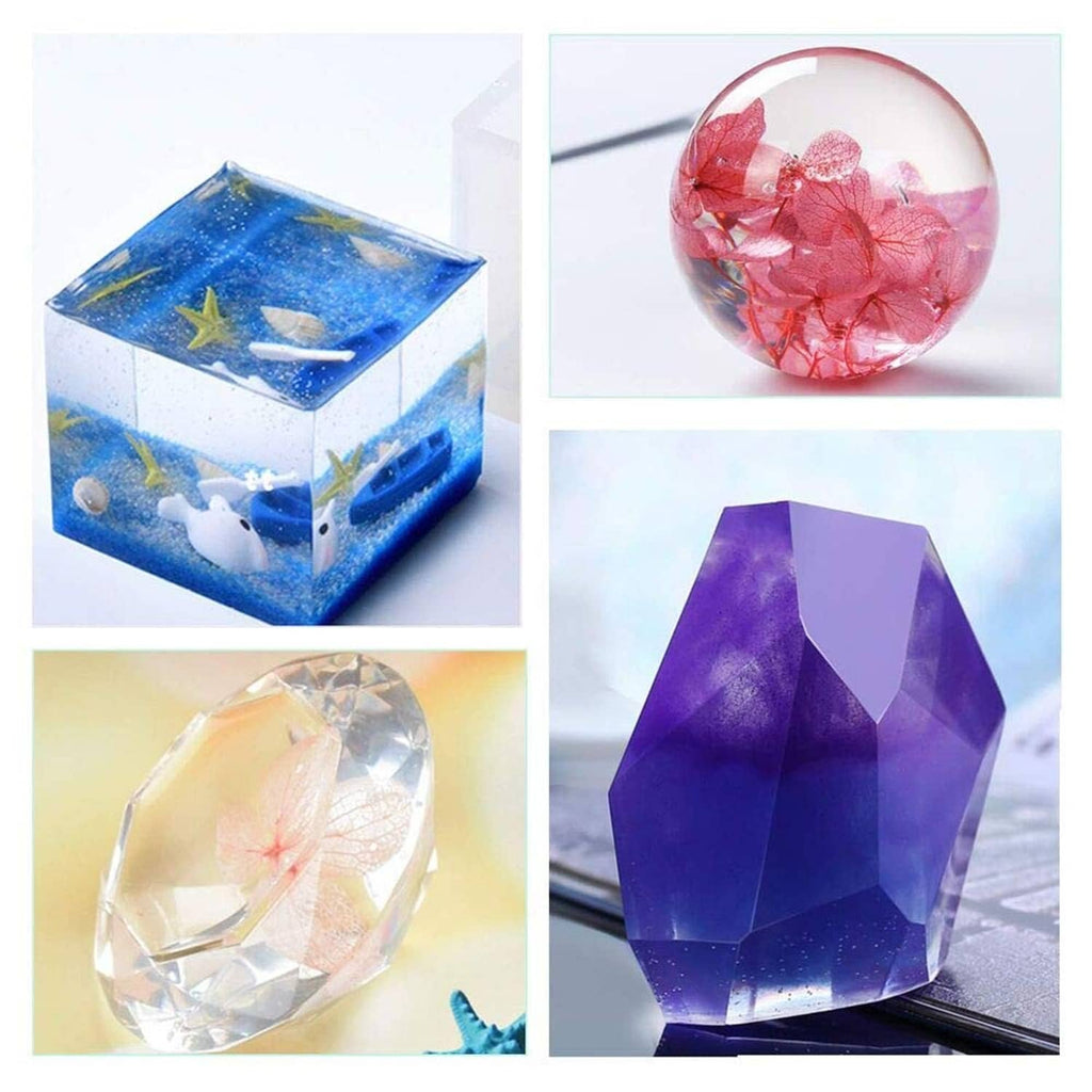 Colorful resin castings: blue block, pink sphere, clear ring, and purple gem