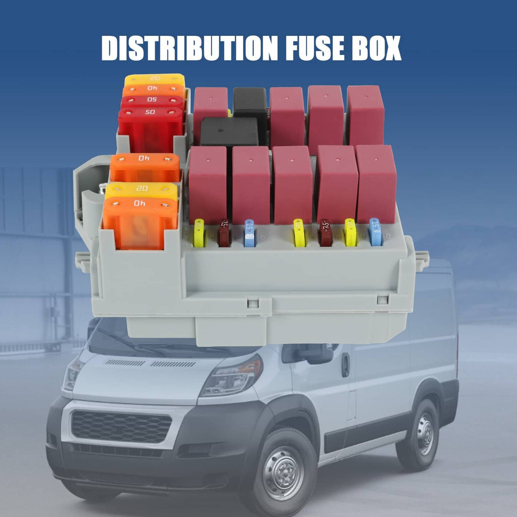 Distribution fuse box with multi-colored fuses and gray housing, angled vehicle view.