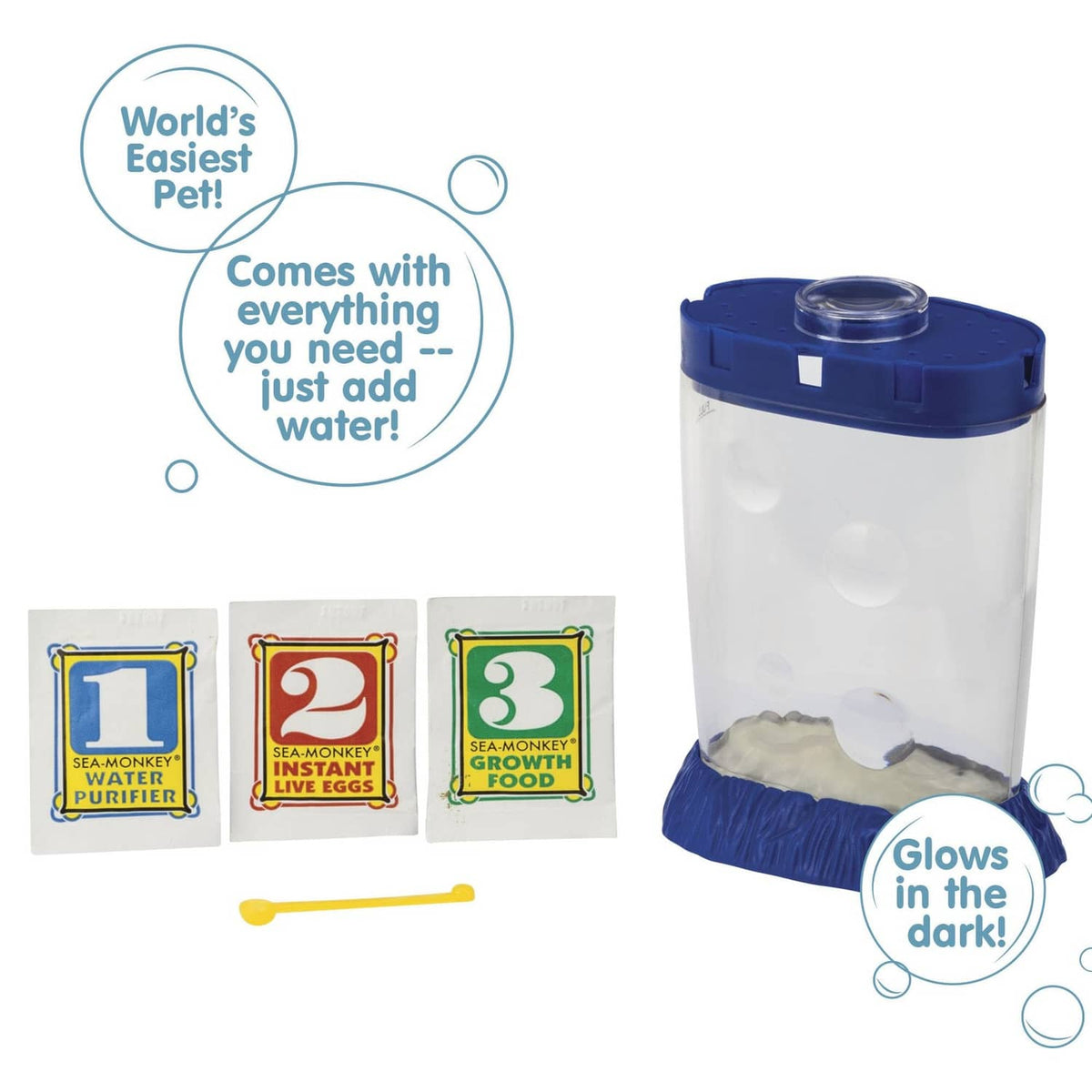 Magiquarium starter kit with clear tank, blue lid base, and three colored supply cards