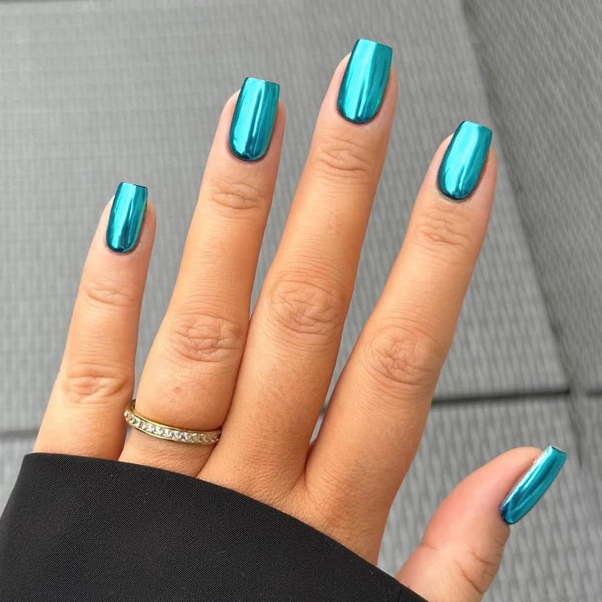 Teal mirror chrome press-on nails with short square shape, glossy metallic finish