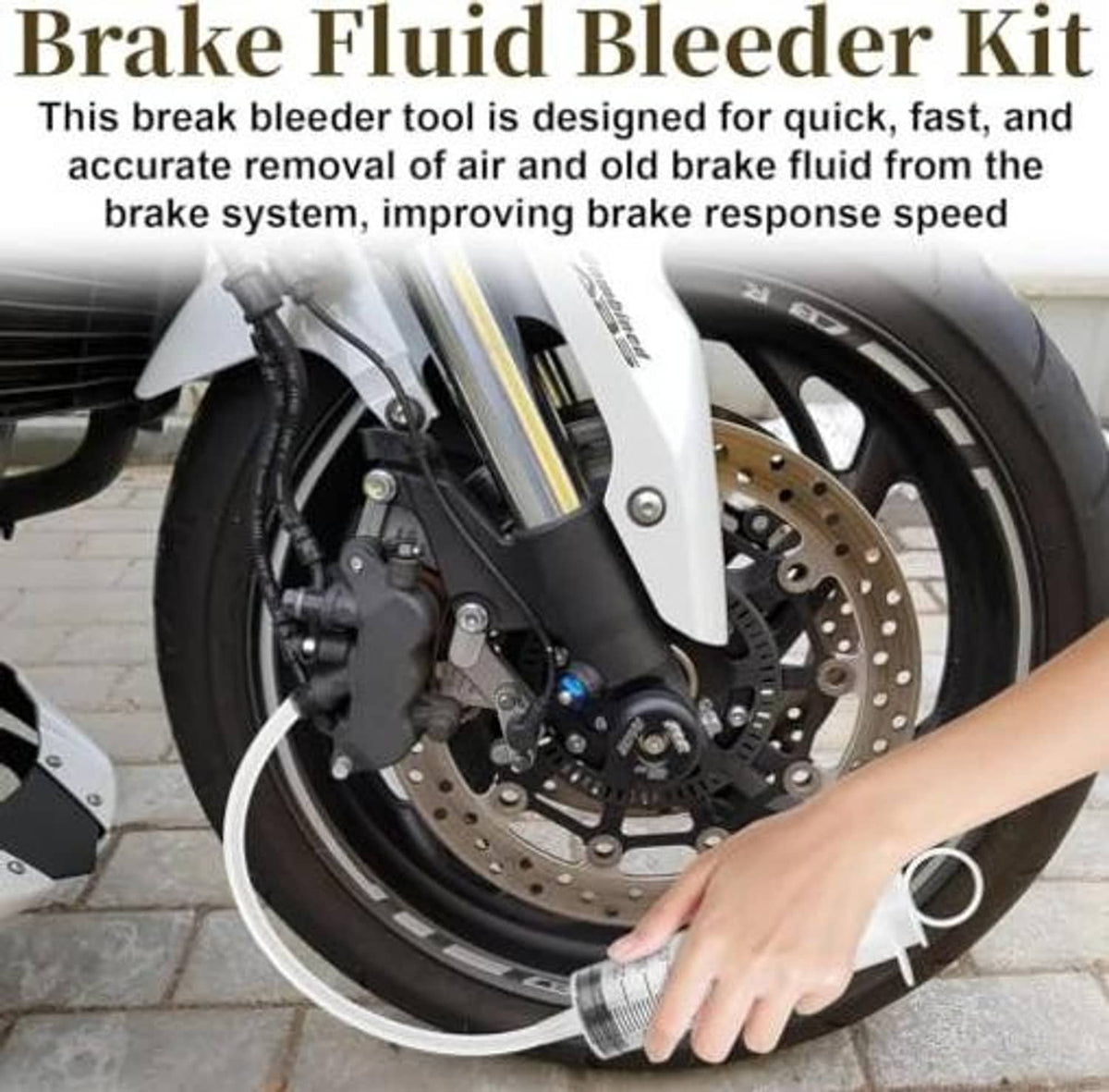 Brake bleeding kit applied to motorcycle disc brake with syringe and clear suction hose