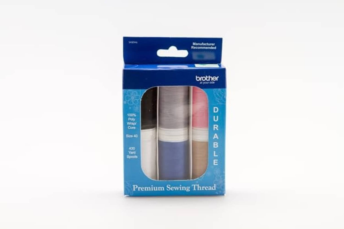 Premium sewing thread pack with dark gray and red wound spools