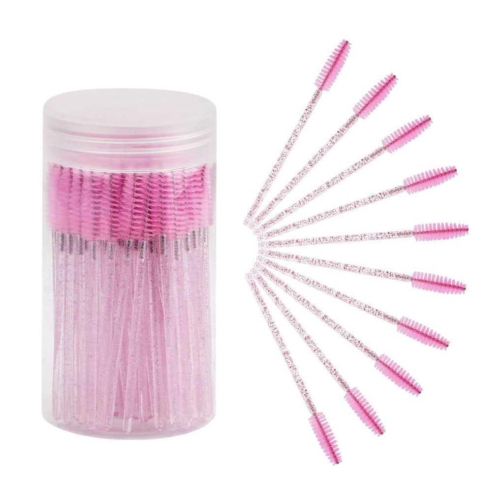 Disposable eyelash mascara wands in a clear pink container, with pink spiral brush tips