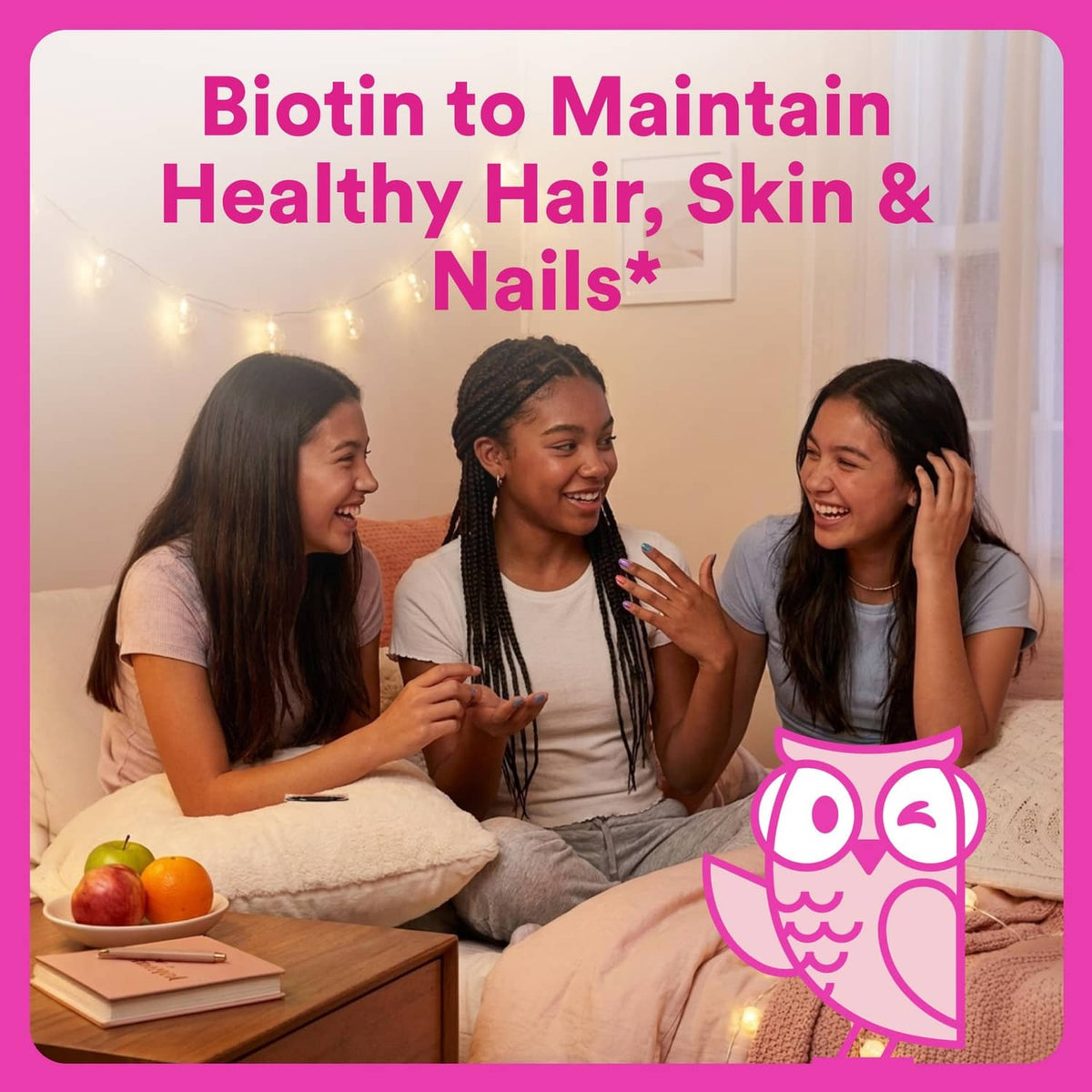 Teen girl holding a gummy next to a pink multivitamin bottle on a bed.