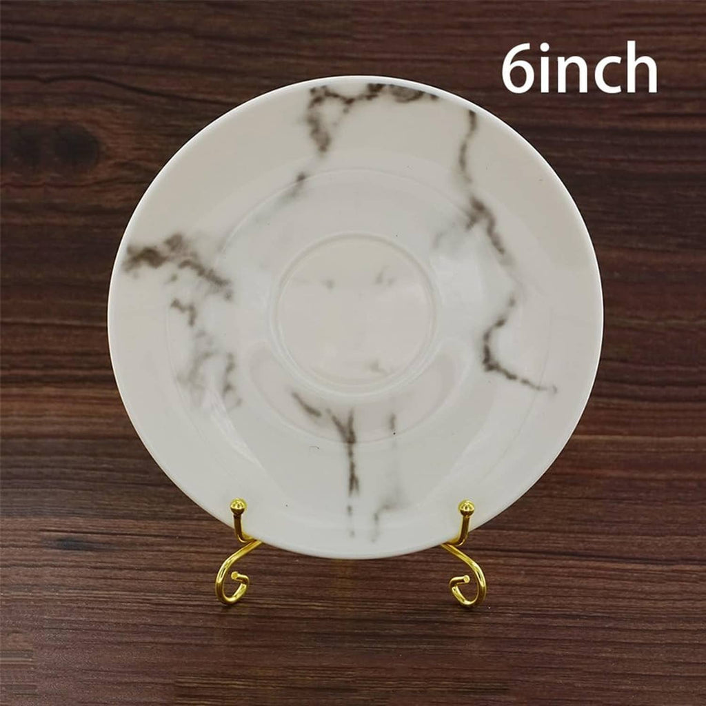 6-inch white plate displayed on gold metal stand with three curled supports.