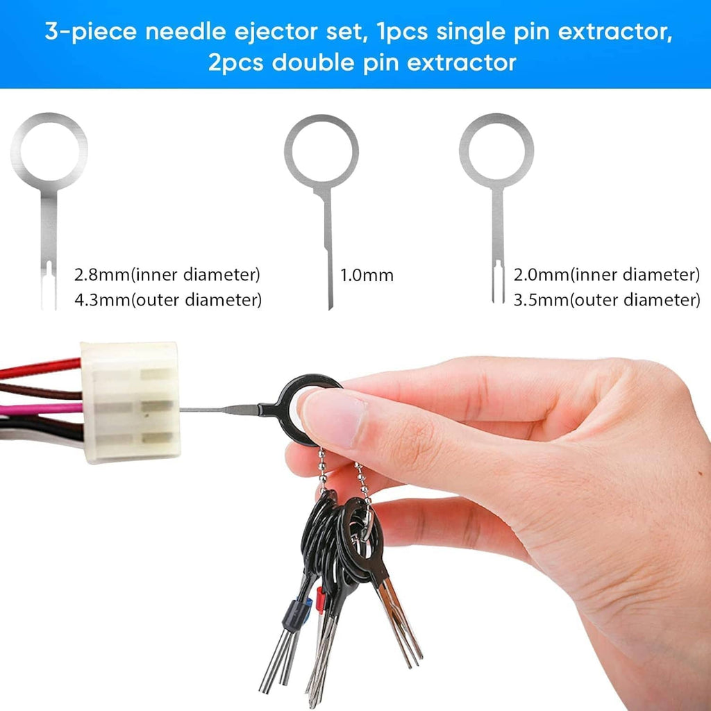 Terminal pin removal extractor set with ring handles and needle tools, held in hand