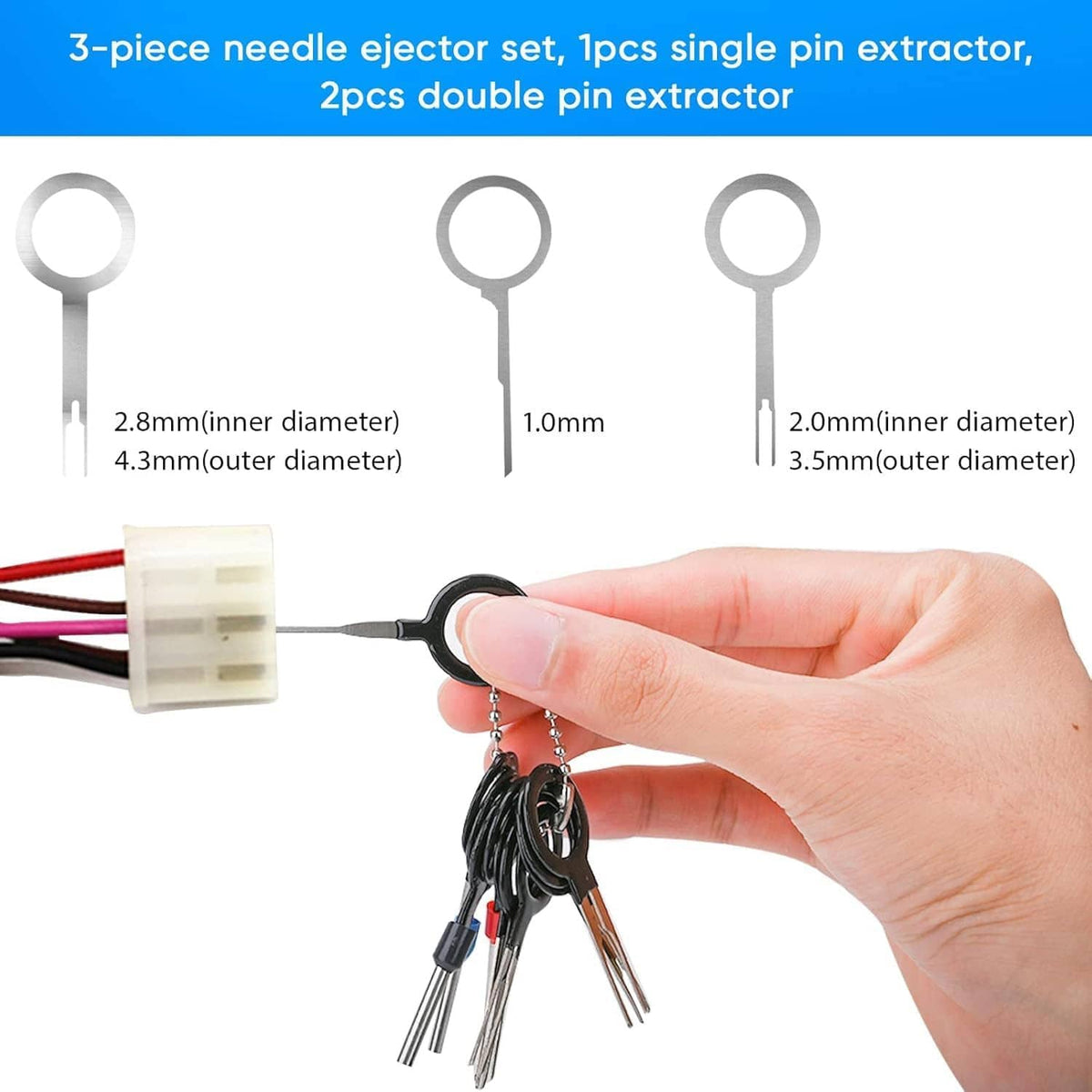 Terminal pin removal extractor set with ring handles and needle tools, held in hand