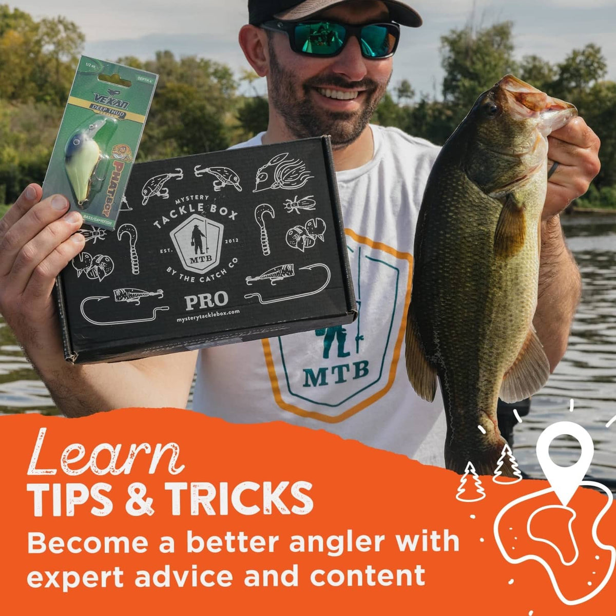 Mystery Tackle Box Pro kit alongside a bass fish held by an angler