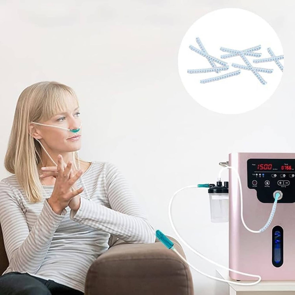 Blue nasal cannula tubing with crimp straighteners connected to oxygen concentrator