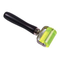 Rubber seam roller applicator with black handle and lime-green wheel