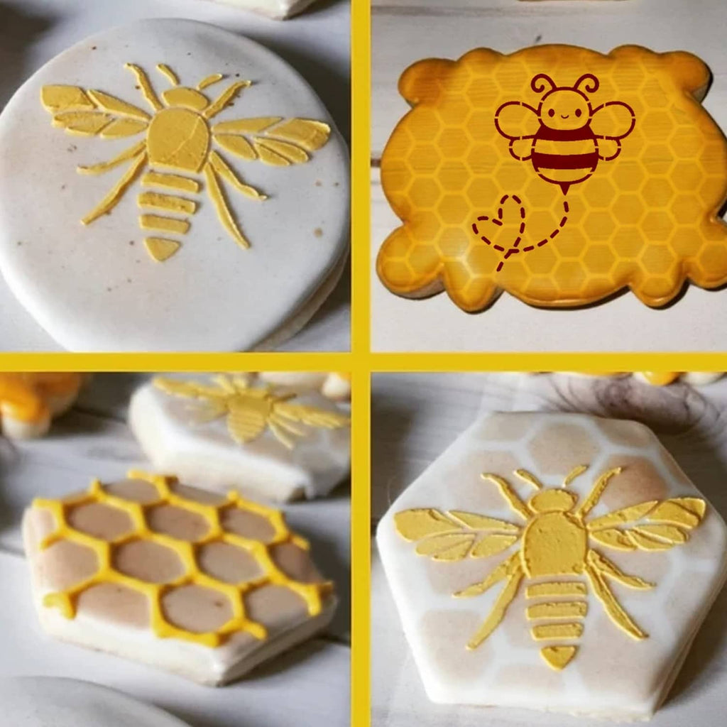 Bee and honeycomb stencil icing designs on yellow-tinted sugar cookies
