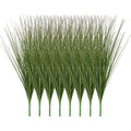 Artificial onion grass plant with green blade bunches, bushy stem tips