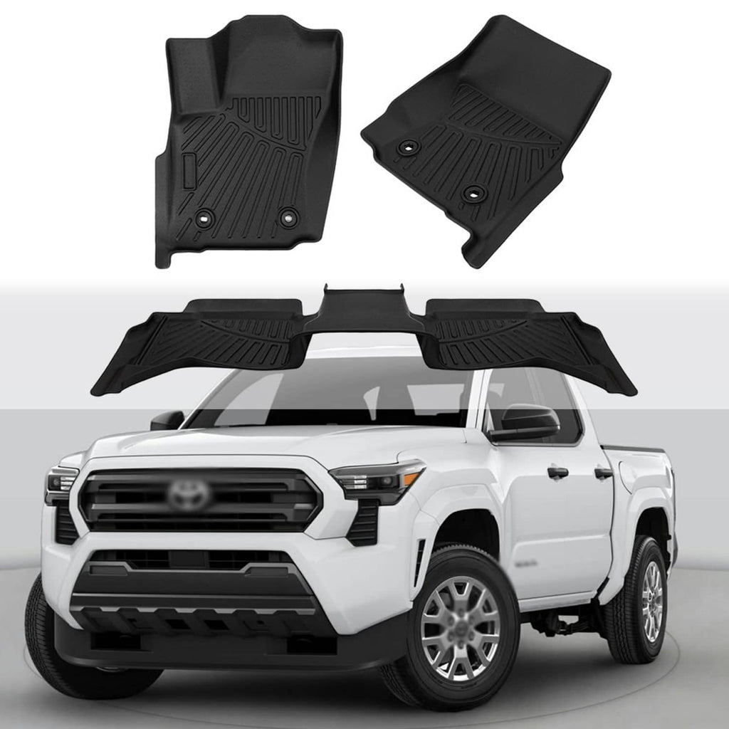 Black floor mats set laid across the cab floor of a pickup truck