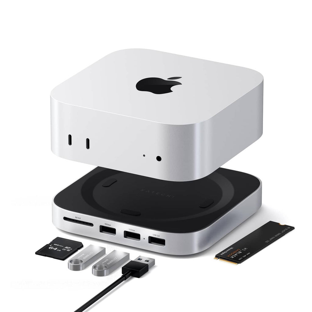 Silver docking hub with black top stand and port openings, plus accessory cards
