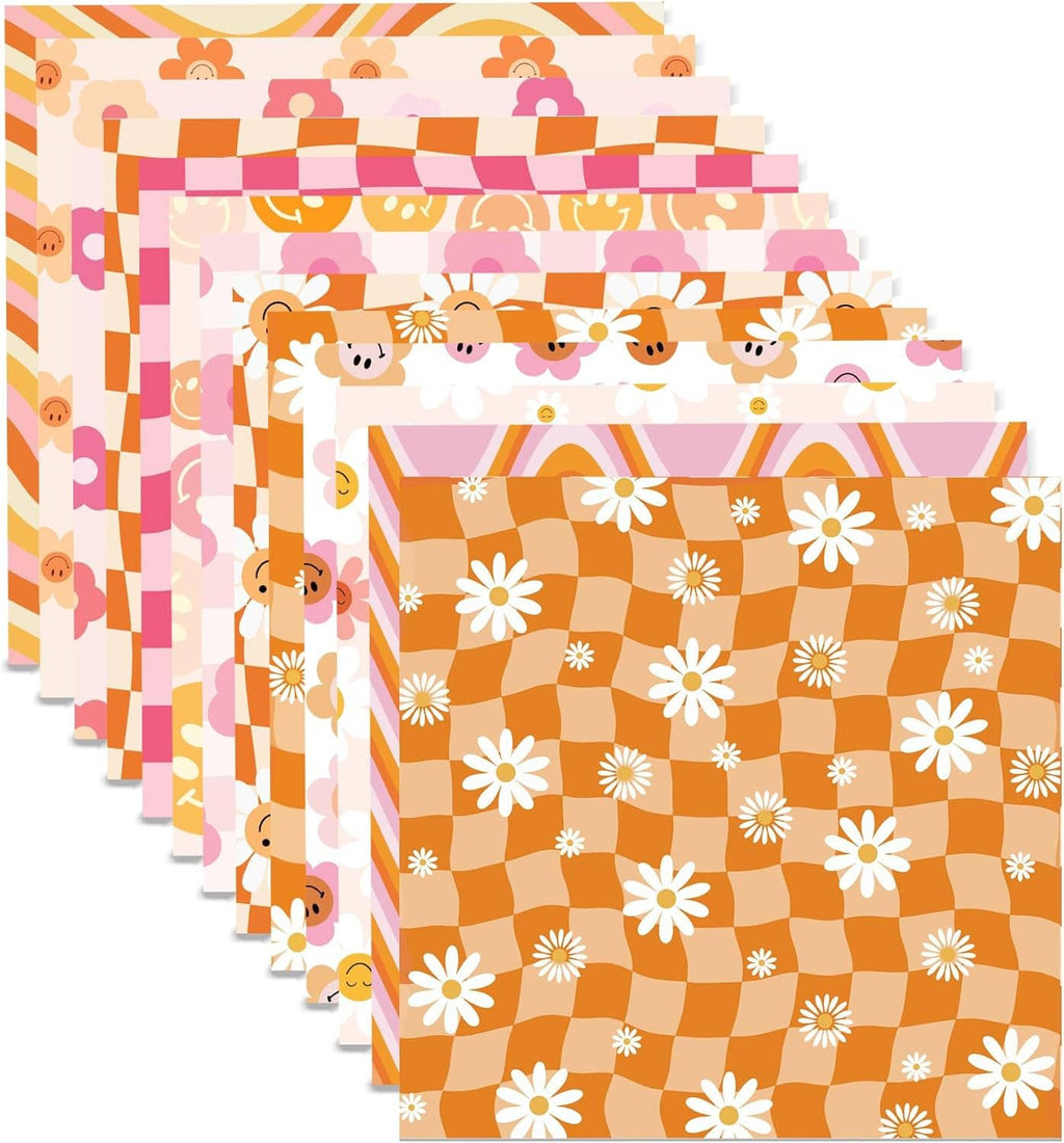Scrapbook paper sheet with orange check pattern and white daisy flowers