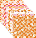 Scrapbook paper sheet with orange check pattern and white daisy flowers