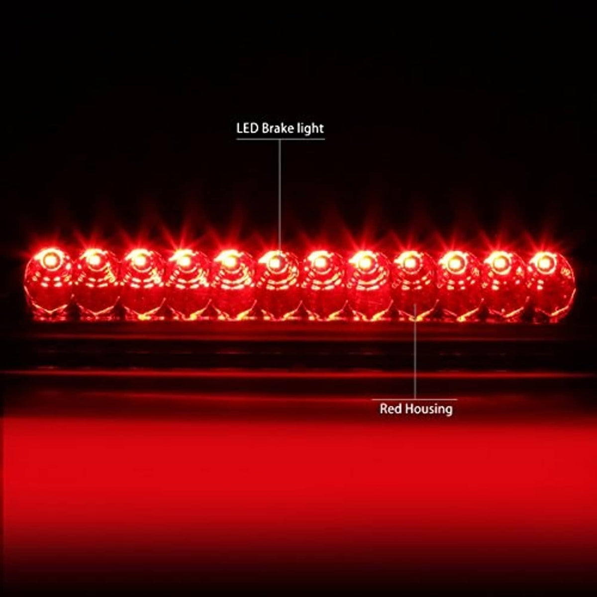 Glowing red LED third brake light with multiple circular diode elements