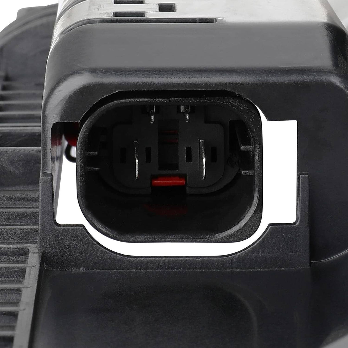 Radiator cooling fan connector port with multiple terminals and red wire lead.