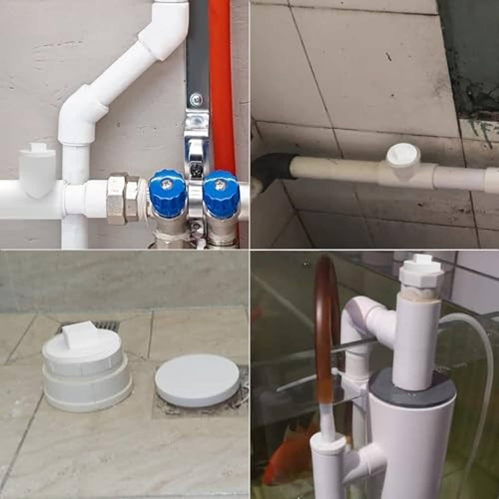 White PVC cleanout plug fitted on a plumbing pipe in a bathroom setup