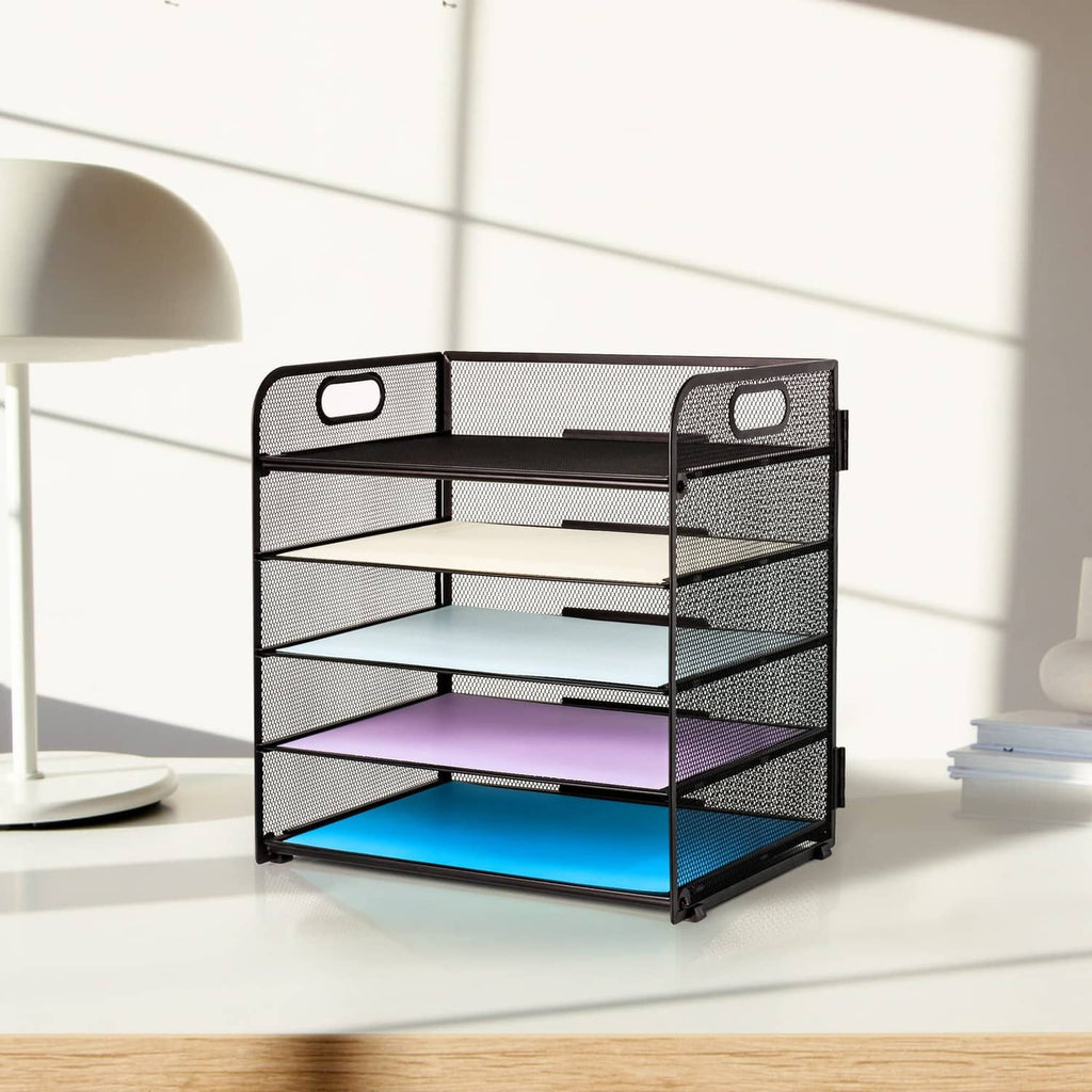 Black mesh 5-tier letter tray organizer with top handle, angled view on desktop.