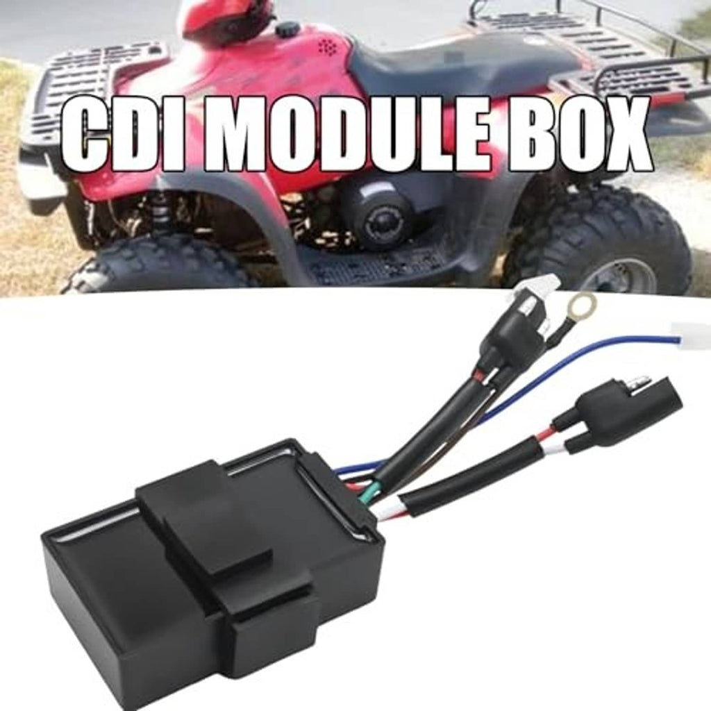 Ignition module box mounted on a red ATV with attached wire harness