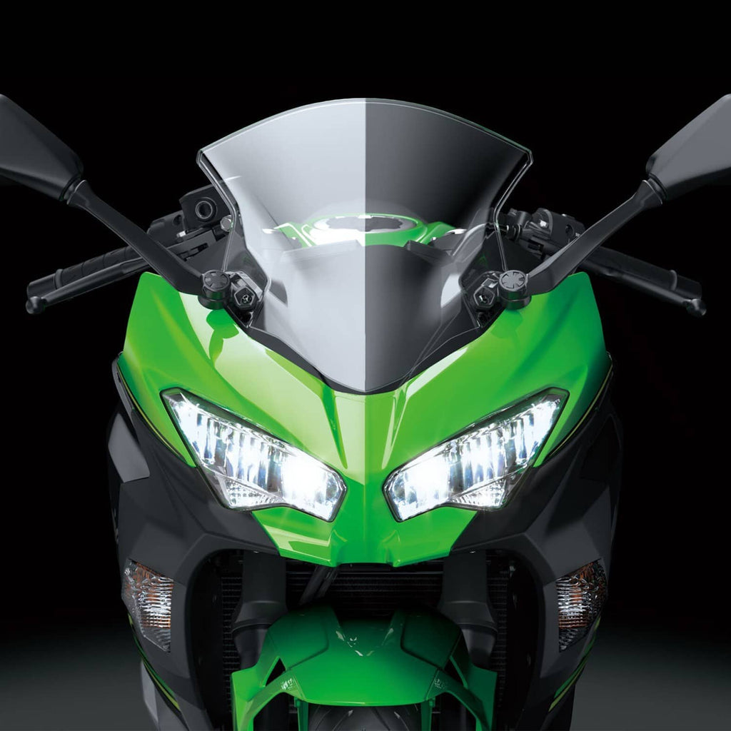 LED headlight pair with clear lenses, lit beams, and black upper stay mounting points