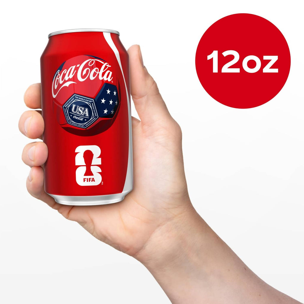 Coca-Cola Original Taste 12 oz soda can held in a hand, with 12oz label