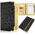 Leopard-print server book with gold elastic strap, guest check page and card slot.
