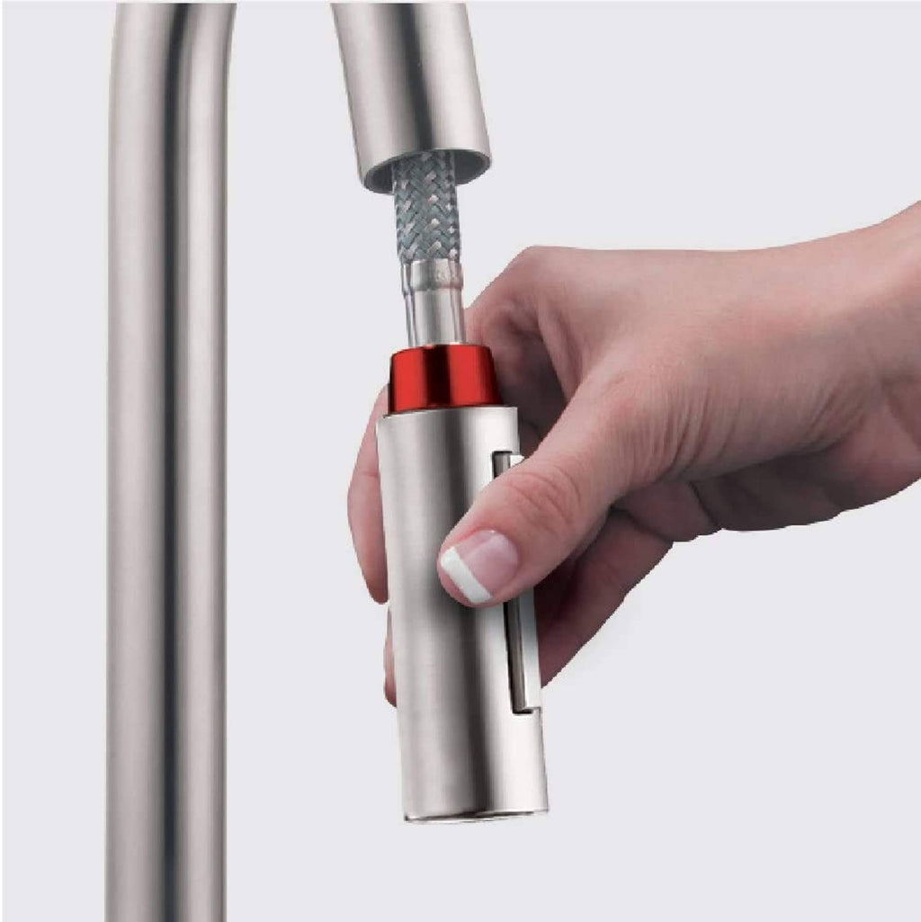 Hand installing pull-down hose replacement to kitchen faucet with red gasket