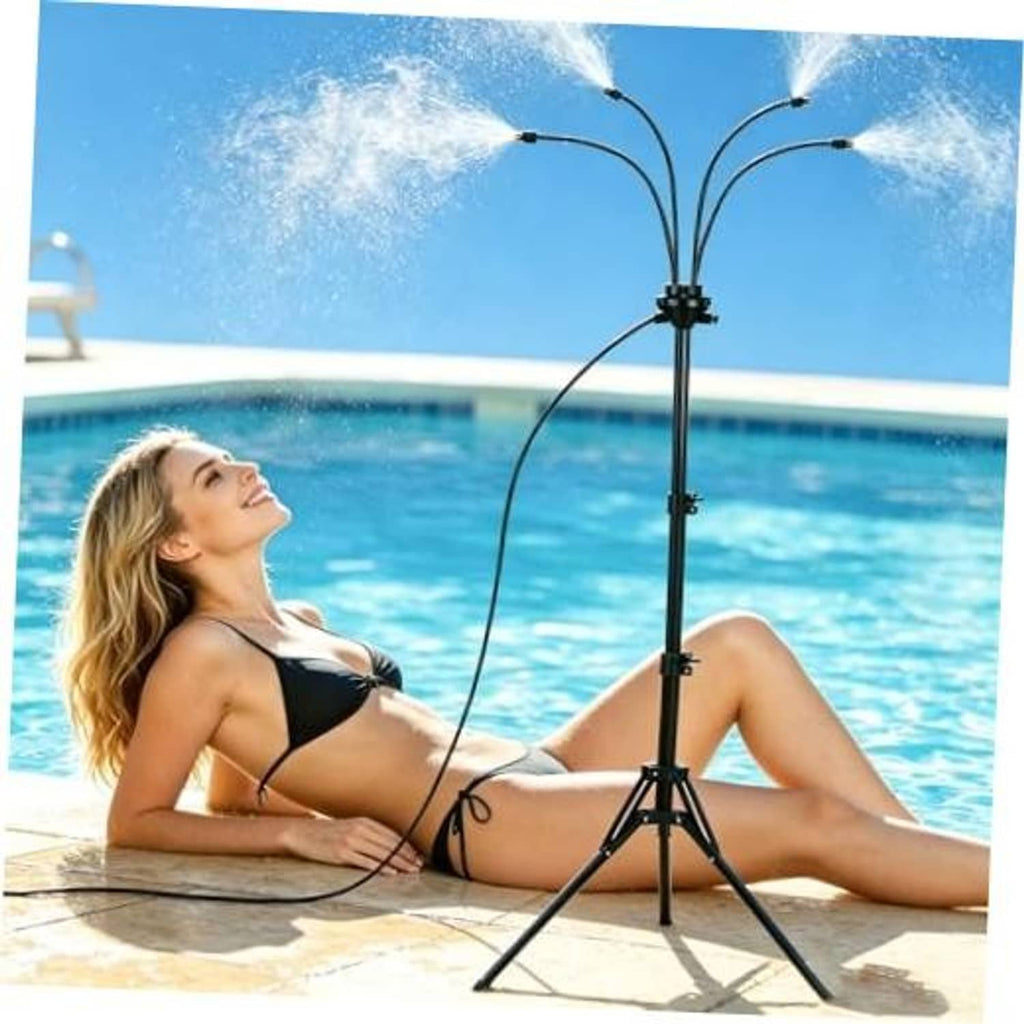 Outdoor misting system stand with tripod and multi-nozzle sprayer, outdoors by pool