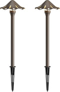 Pair of dark bronze low-voltage LED pathway lights with spike bases and decorative tops