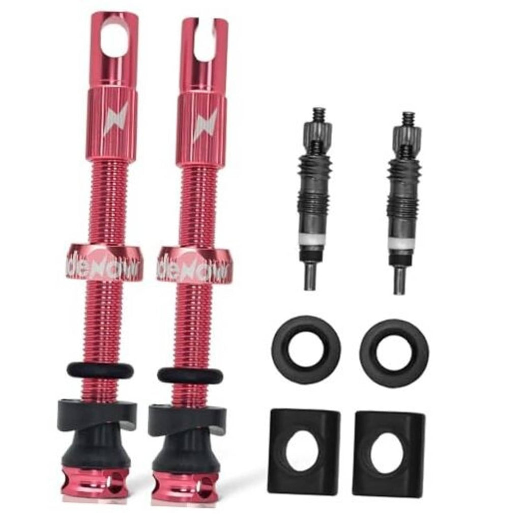Pink tubeless Presta valve stems with O-rings and mounting grommets
