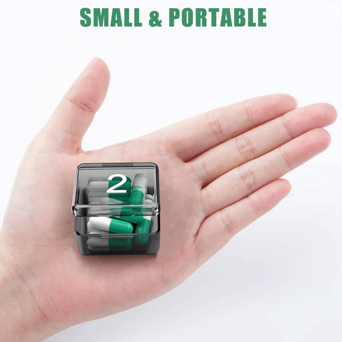 Small portable pill organizer case holding green capsules in numbered tray
