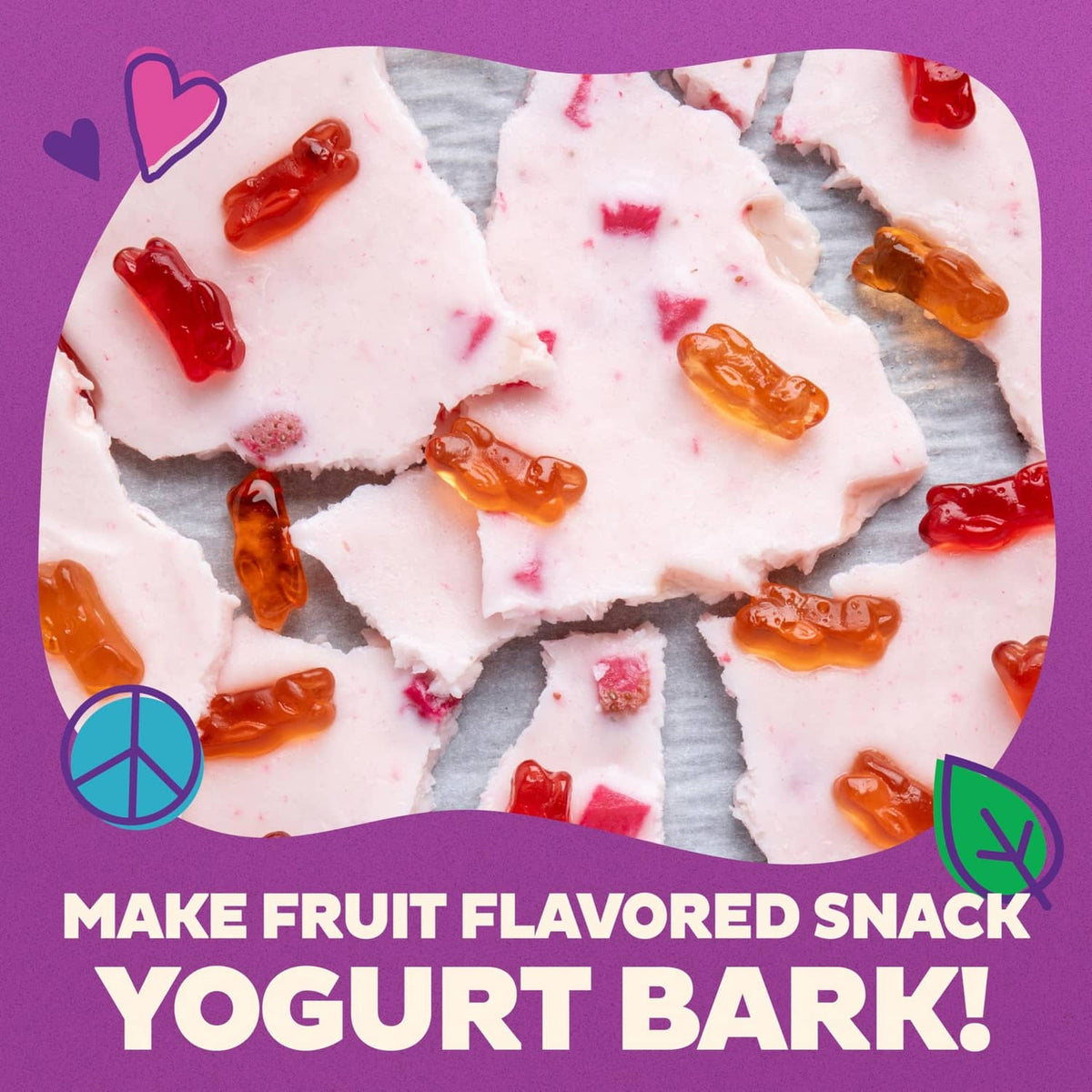 Fruit-flavored yogurt bark with red and orange fruit snack pieces